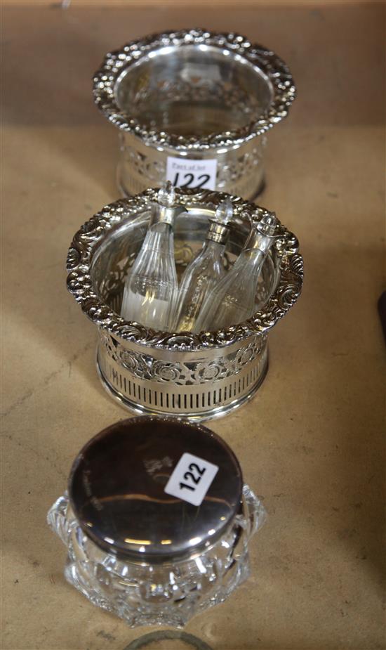 Pair of silver plated wine coasters, 3 silver topped condiment bottles and a silver topped powder jar